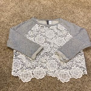 gray and white lace sweater